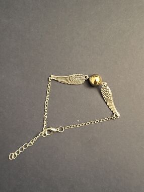Silver Wing Charm Bracelet with Gold Accent - Women's Jewelry